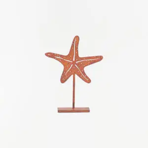 Estrella de mar decorativa en hierro con base